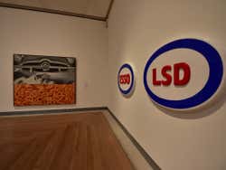 An art museum with paintings on the wall