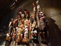 A wall full of colourful sculptures
